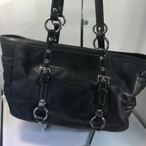 Ladies Leather Coach Handbag with Coach Name on it